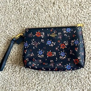 Medium Dark Blue Clutch Purse with Red, Blue and Pink Floral Design